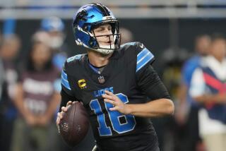 Detroit Lions quarterback Jared Goff drops back for a pass during a game against the Seattle Seahawks.