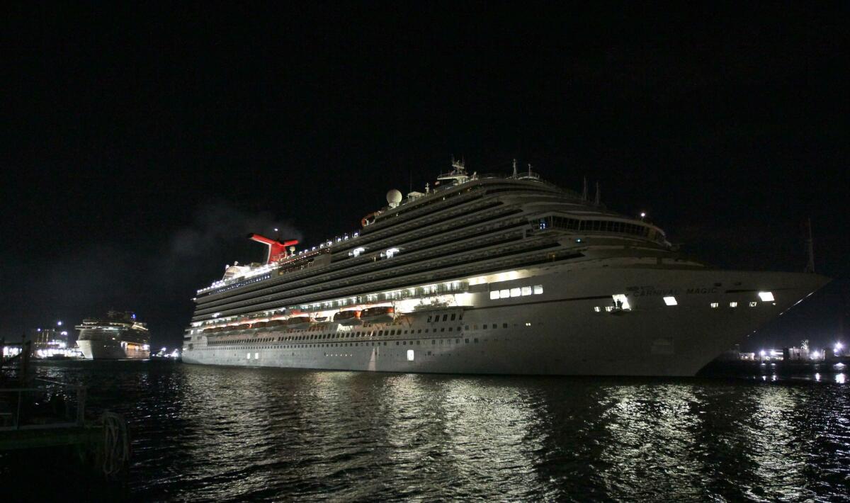 The Carnival Magic docks at Pier 25 in Galveston, Texas, early Sunday. A passenger aboard the cruise ship had been in voluntary isolation in her cabin because of potential contact with the Ebola virus.