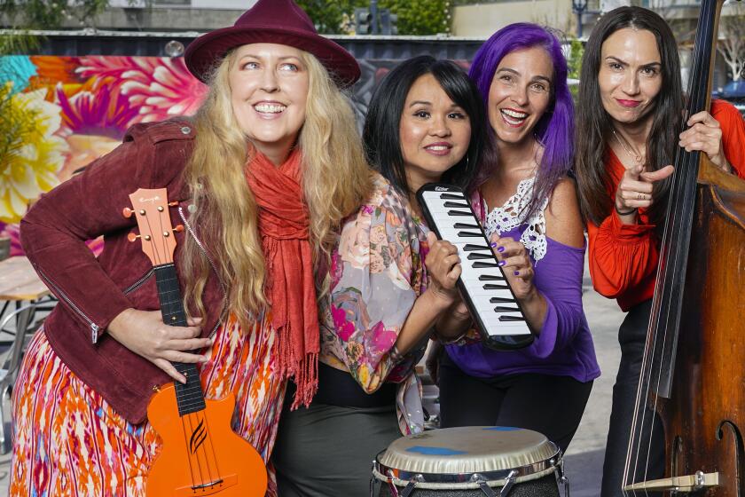 SAN DIEGO, CA - APRIL 16: Members of Women in Jazz, Allison Adams Tucker, left, Melonie Grinnell, Monette Marino, Evona Wascinski, Samantha Lincoln, and Lexi Pulido, right, will perform on April 30, at the Quartyard in East Village, celebrating International Jazz Day 2022. Photographed April 16, 2022. (Howard Lipin / For The San Diego Union-Tribune)