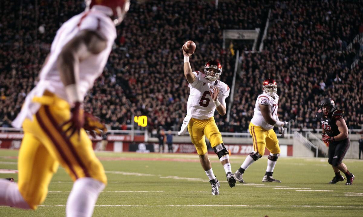 USC quarterback Cody Kessler hooks up with Darreus Rogers, left, for a fourth quarter touchdown against Utah at Rice-Eccles Stadium.