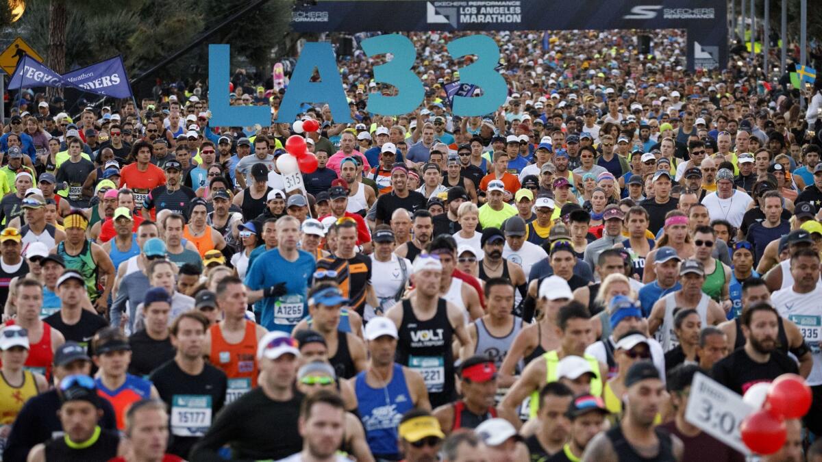 Runners start in last year's L.A. Marathon at Dodger Stadium.