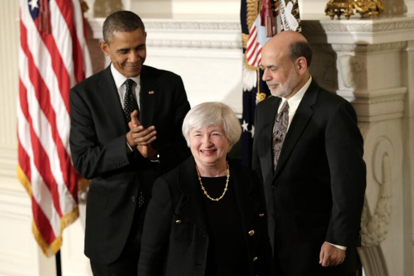Janet L. Yellen smiles as President Obama and Ben Bernanke applaud her during a news conference to announce her nomination to chair the Federal Reserve in 2013.