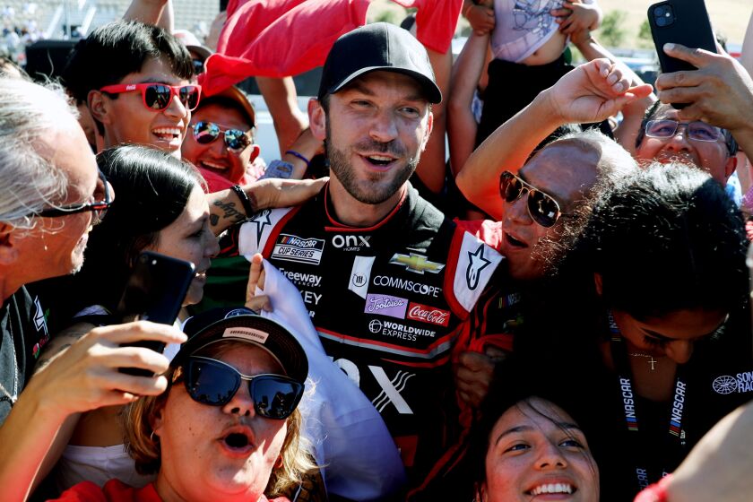 SONOMA, CA - JUNE 12: Mexican NASCAR driver Daniel Suarez, 30, No. 99 car, celebrates.