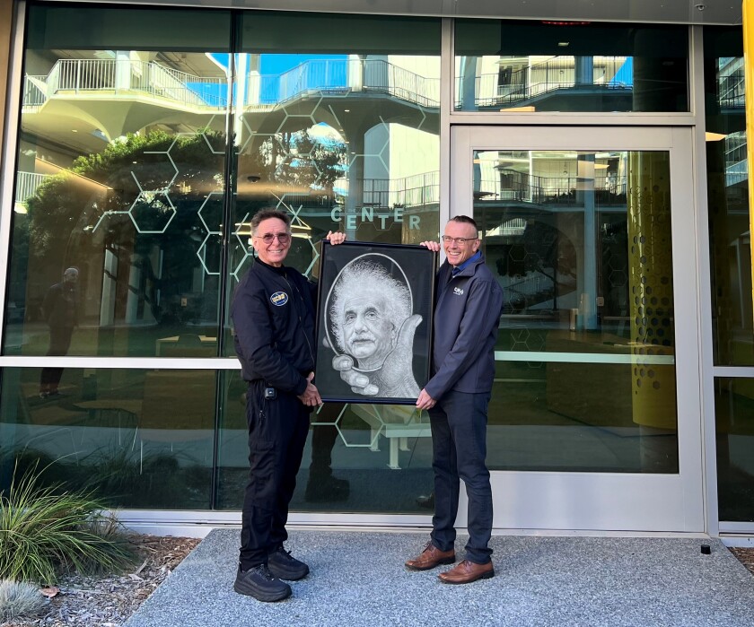 La Jollan Christopher Canole (left) and UC San Diego Dean of Physical Sciences Steven Boggs