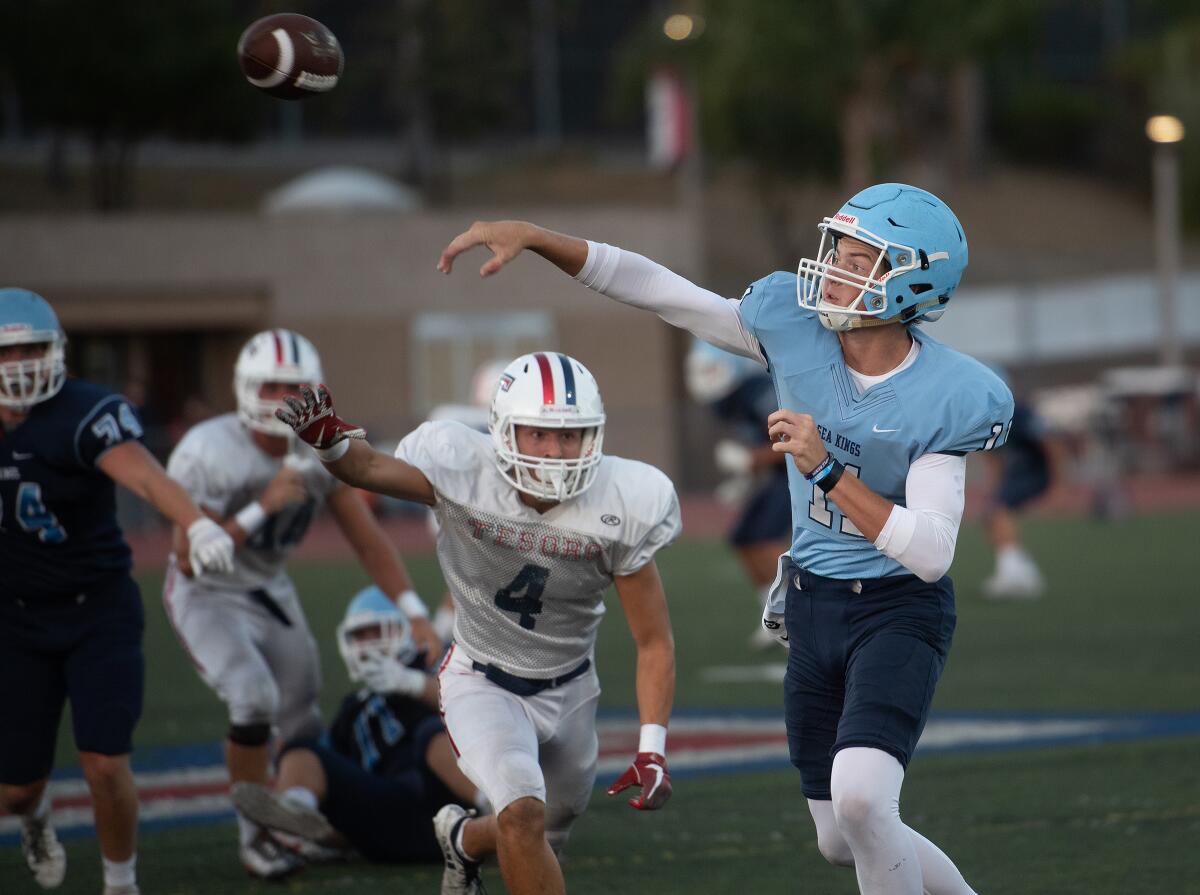 Corona del Mar quarterback Ethan Garbers throws the ball in a scrimmage at Tesoro High on Friday.