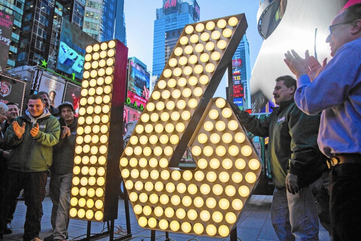 Numerals to mark the coming year are unveiled in Times Square on Dec. 15.