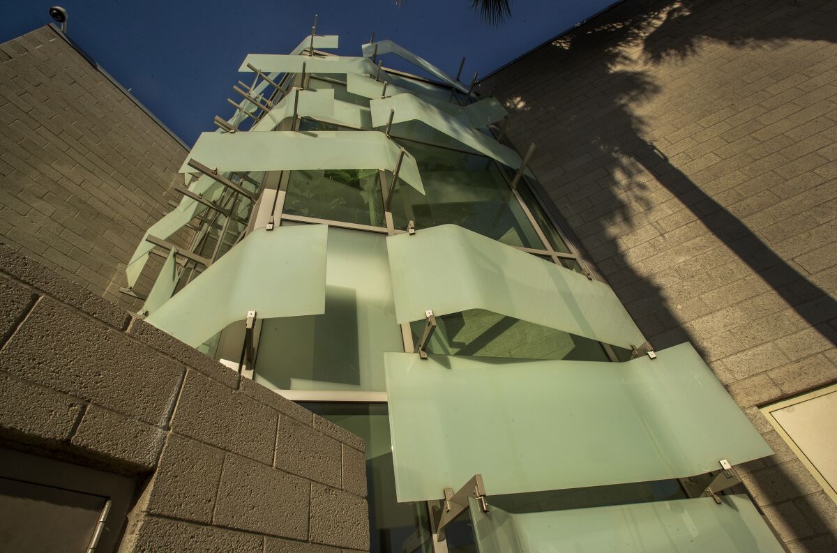 Overall, shows the decorative panels on the back, exterior structure of the LAPD Hollenbeck Station