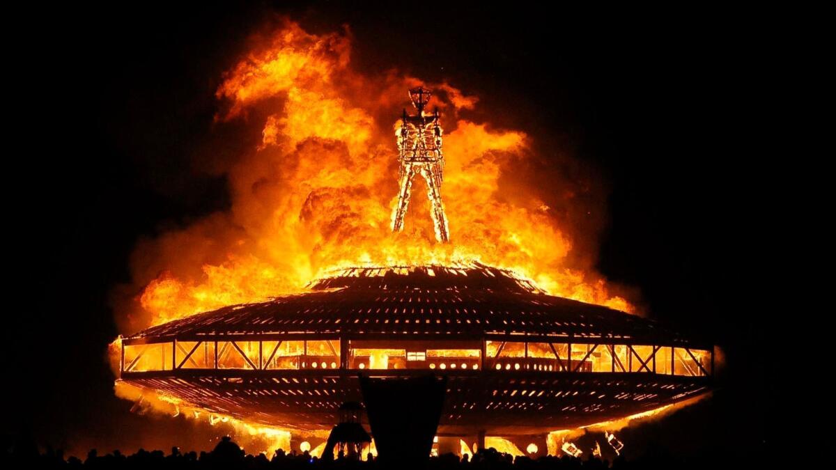 The "Man" burns on the Black Rock Desert at Burning Man near Gerlach, Nev. on Aug. 31, 2013.