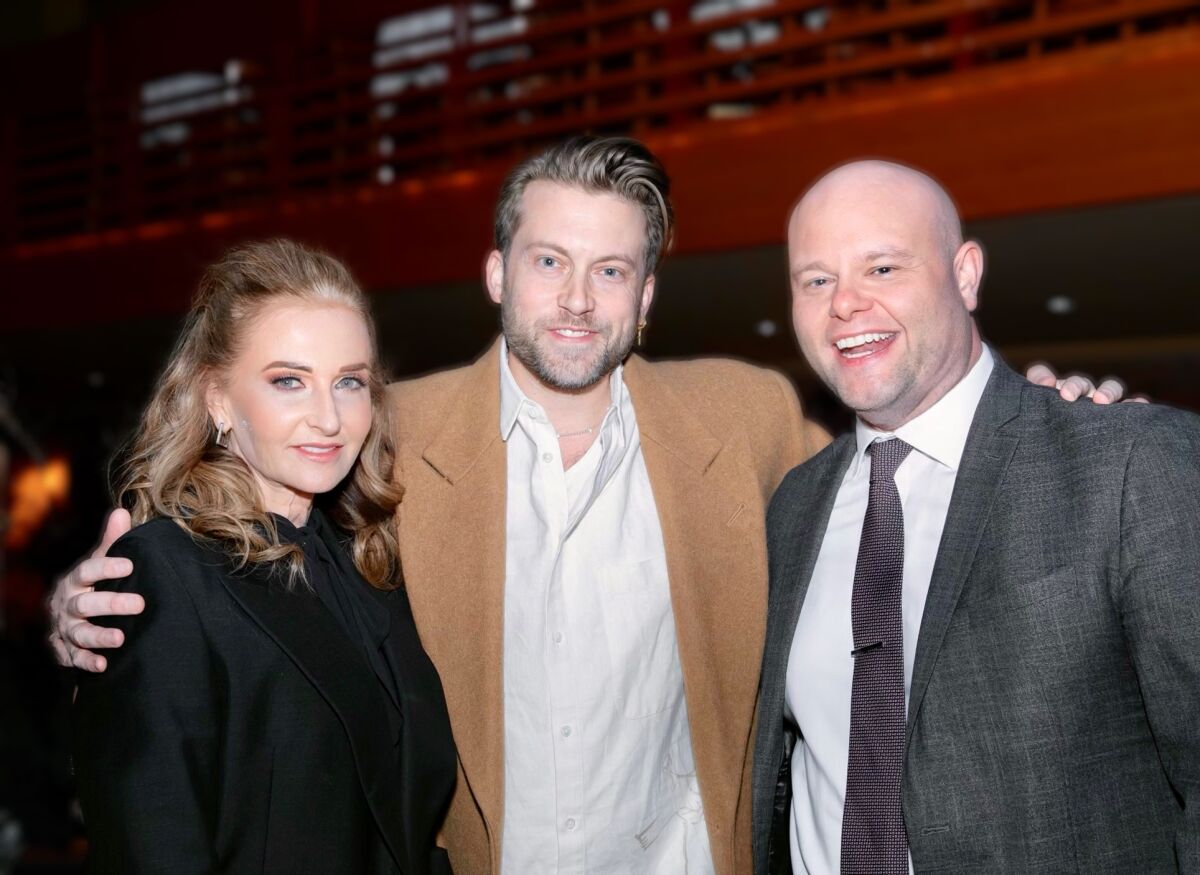 Gloria Brandes, James Darrah and Tyler Ennis attend the West-Eastern Divan Ensemble concert.