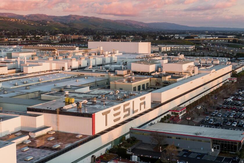 Automaker Tesla's Fremont, Calif., factory is pictured in a drone photo on Thursday, March 11, 2021.
