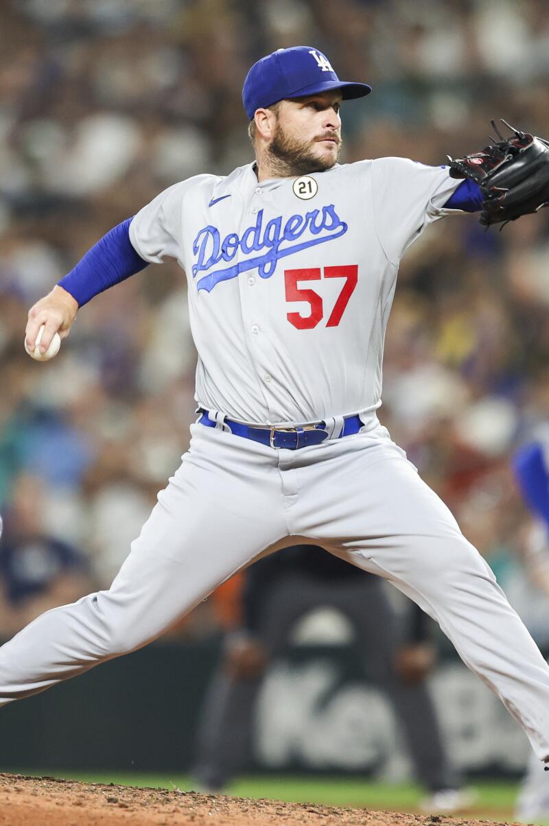 Los Angeles Dodgers relief pitcher Ryan Brasier throws against the Seattle Mariners during the eighth inning of a baseball game Friday, Sept. 15, 2023, in Seattle. (AP Photo/Maddy Grassy)