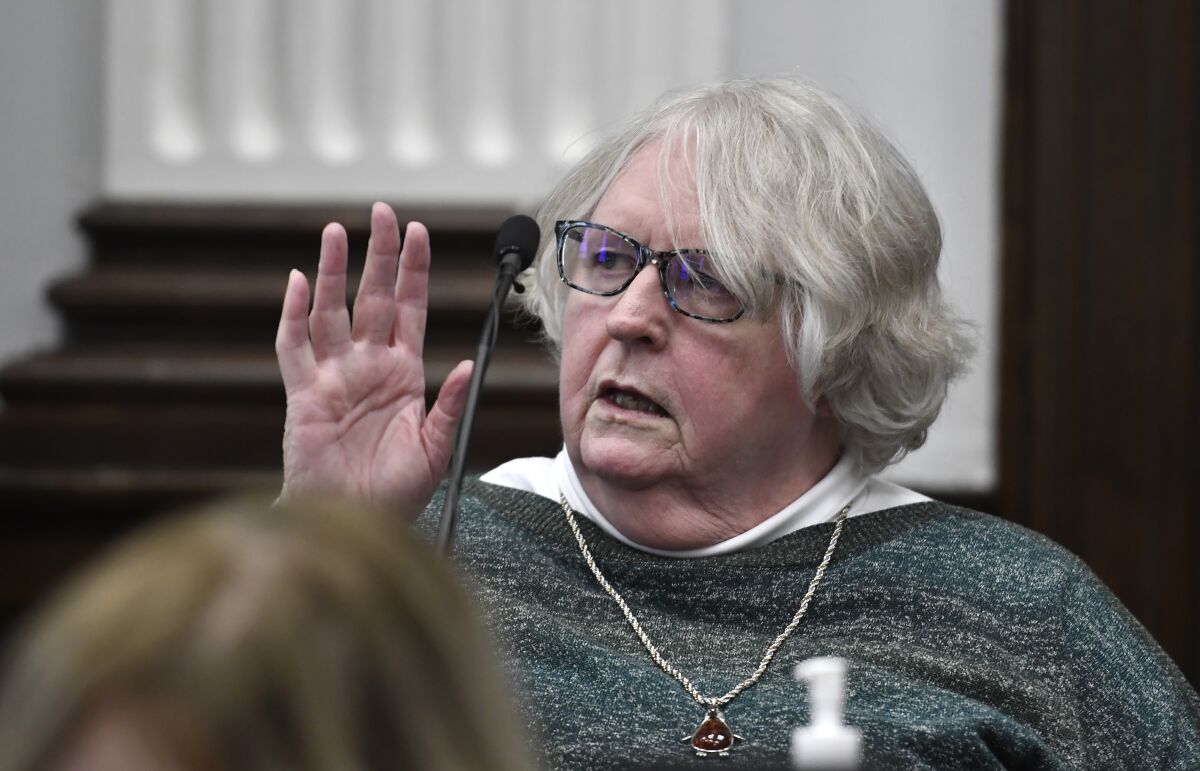 Susan Hughes, the late Anthony Huber's great aunt, is sworn in during Kyle Rittenhouse's trial at the Kenosha County Courthouse in Kenosha, Wis., on Friday, Nov. 5, 2021. Anthony Huber was one of two men who Rittenhouse killed on Aug. 25, 2020. (Sean Krajacic/The Kenosha News via AP, Pool)