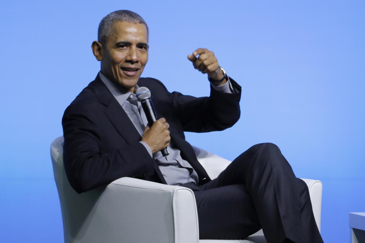 Former President Obama speaks to young Asian leaders on Friday during a conference in Kuala Lumpur, Malaysia, that was hosted by his foundation.