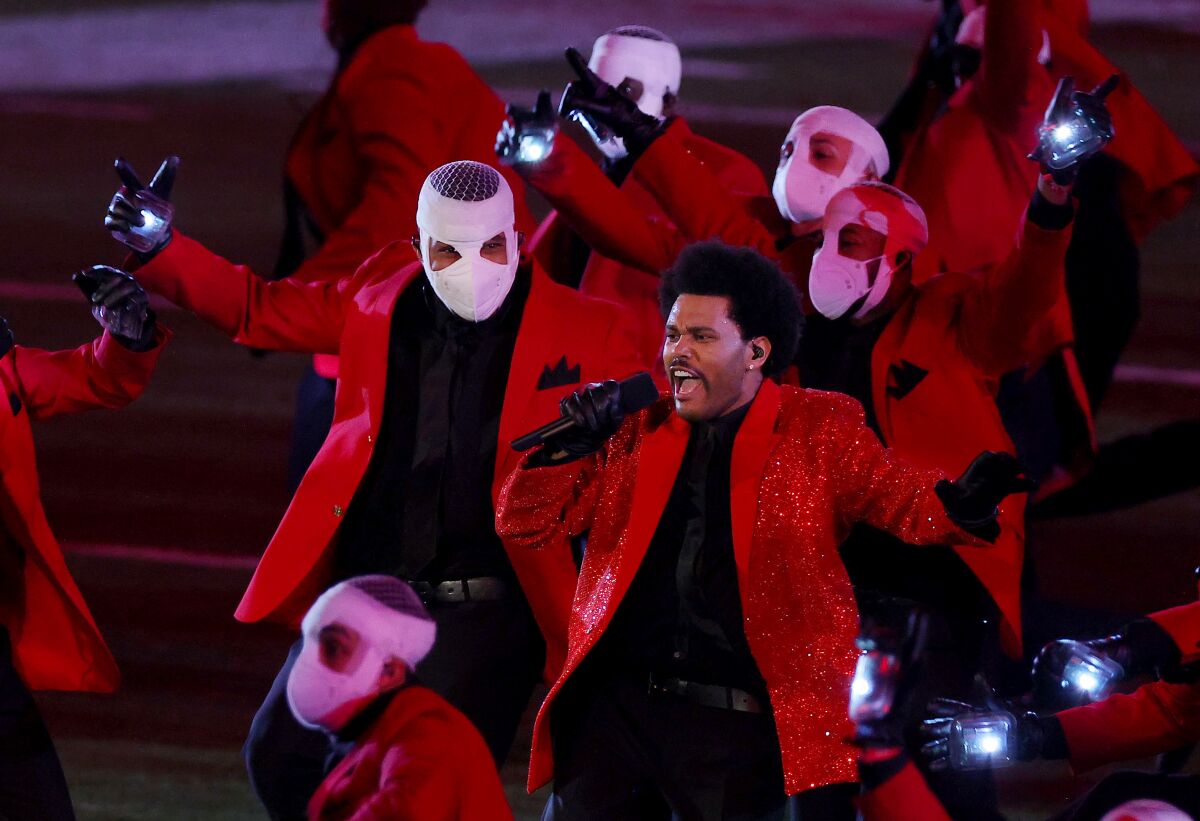 The Weeknd performs at the Pepsi Super Bowl LV Halftime Show at Raymond James Stadium