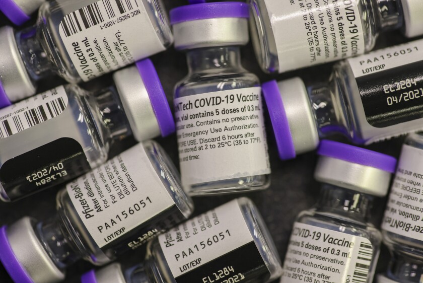 Vials filled with doses of the Pfizer COVID-19 vaccine ready to go at the San Diego Fire-Rescue Training Facility