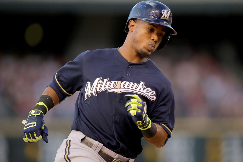 Brewers shortstop Jean Segura rounds the bases after hitting his second home run against the Colorado Rockies during a game last month in Denver.