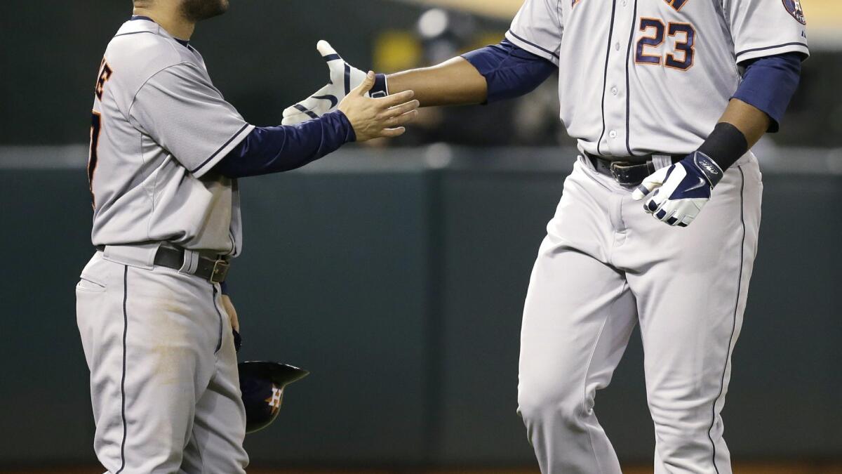 Chris Carter drives in 5, Astros beat Angels 8-2 - The San Diego  Union-Tribune