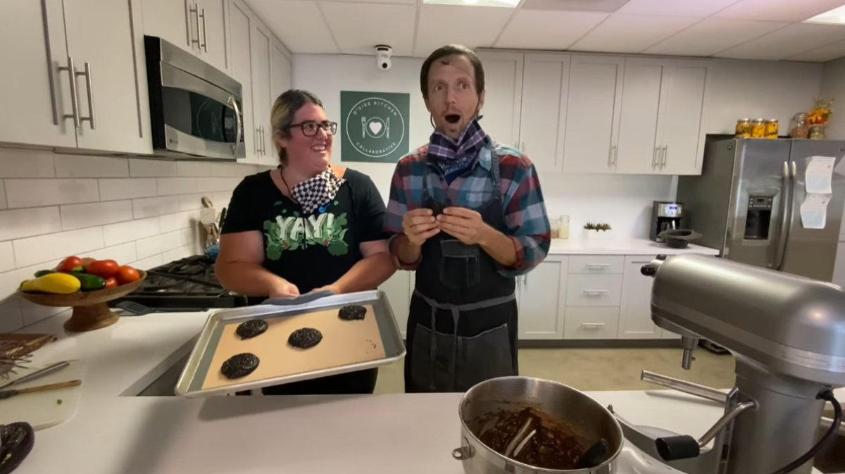 Vallie Gilley and Jason Mraz baking cookies at O'Side Kitchen Collaborative