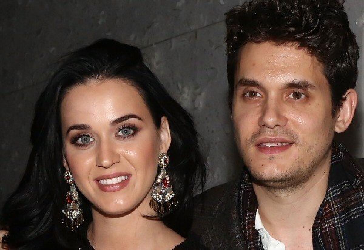 Katy Perry and John Mayer got cozy over the Christmas holiday, and she's got the tweets to prove it.