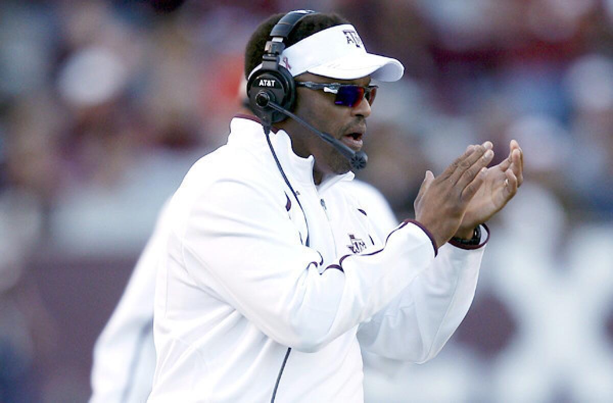 Texas A&M; Coach Kevin Sumlin encourages his team in the fourth quarter of a game against Auburn last month.