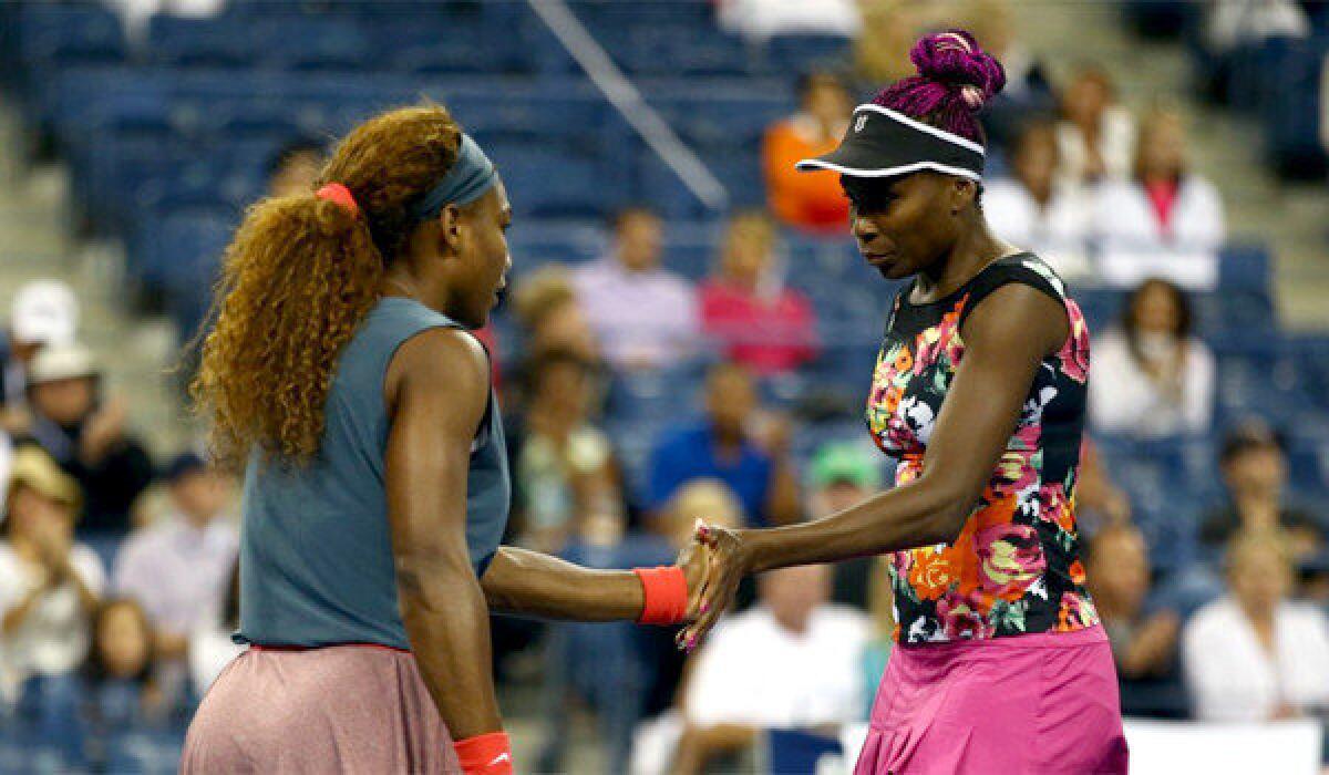 Serena Williams and Venus Williams were eliminated in doubles play at the U.S. Open.