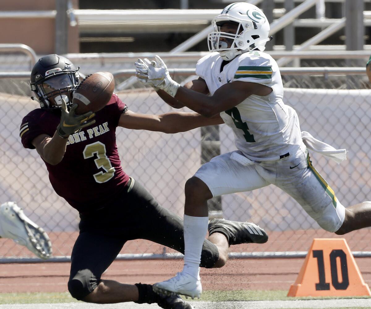 Narbonne cornerback Macen Williams breaks up a pass intended for Lone Peakreceibver Trajan Hansen during the third quarter Saturday.