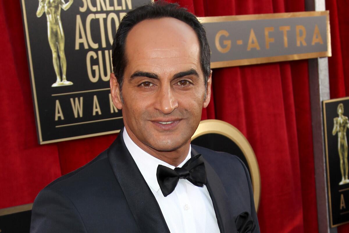 Navid Negahban of "Homeland" arrives at the 19th Screen Actors Guild Awards in Los Angeles on Sunday.