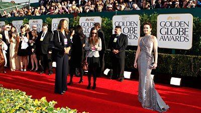 Carla Gugino arrives at the Golden Globes.