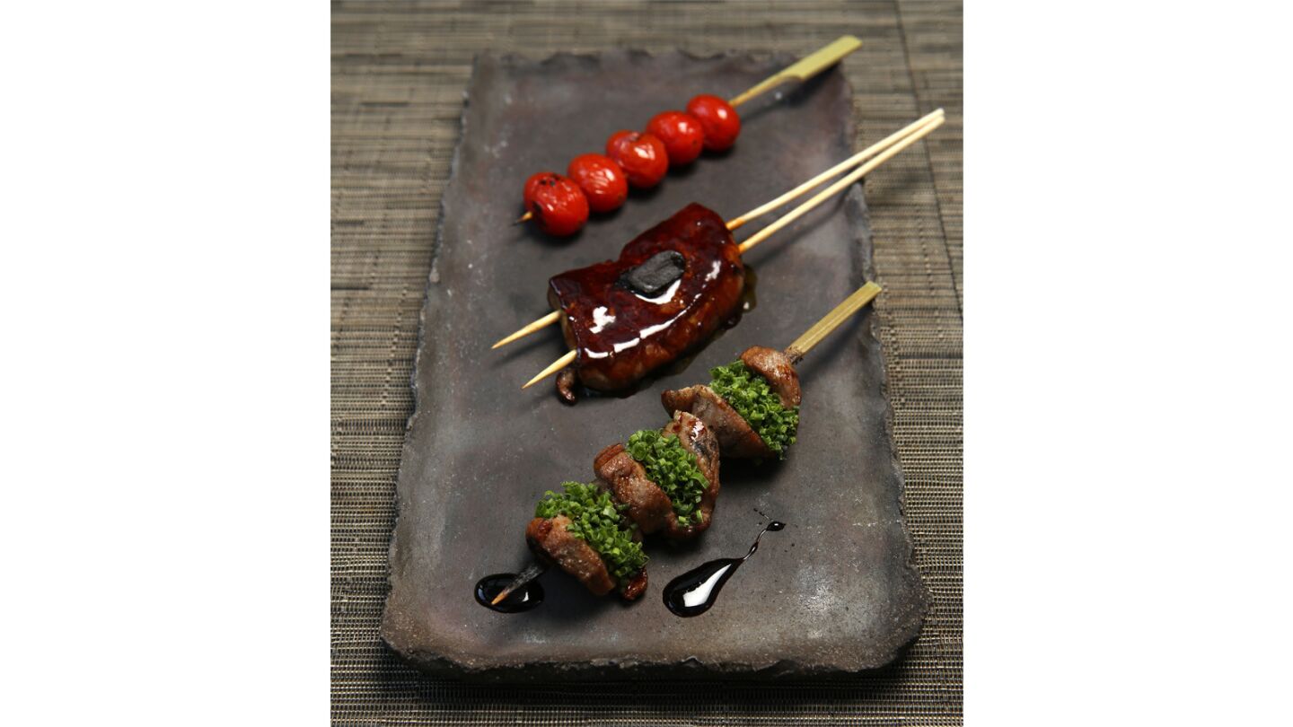 Robata grilled tomato, foie gras with glazed soy-based sauce and duck with balsamic soy sauce.