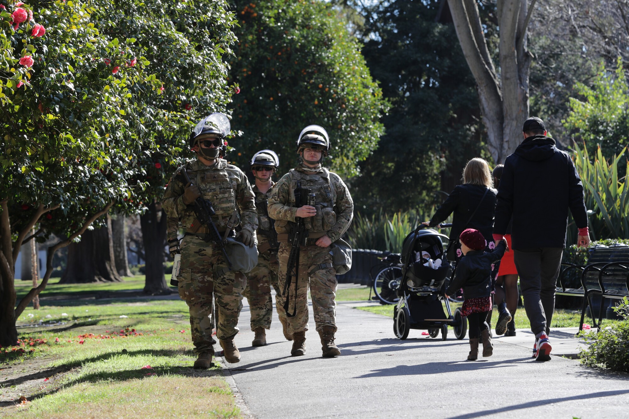 National Guard patrol California State Capitol Park, adjacent to Capitol, Saturday.