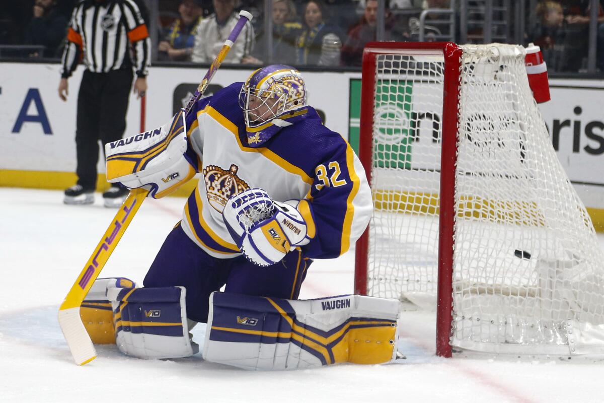 Kings goalie Jonathan Quick can't stop a shot by Philadelphia's Scott Laughton during the first period Saturday.