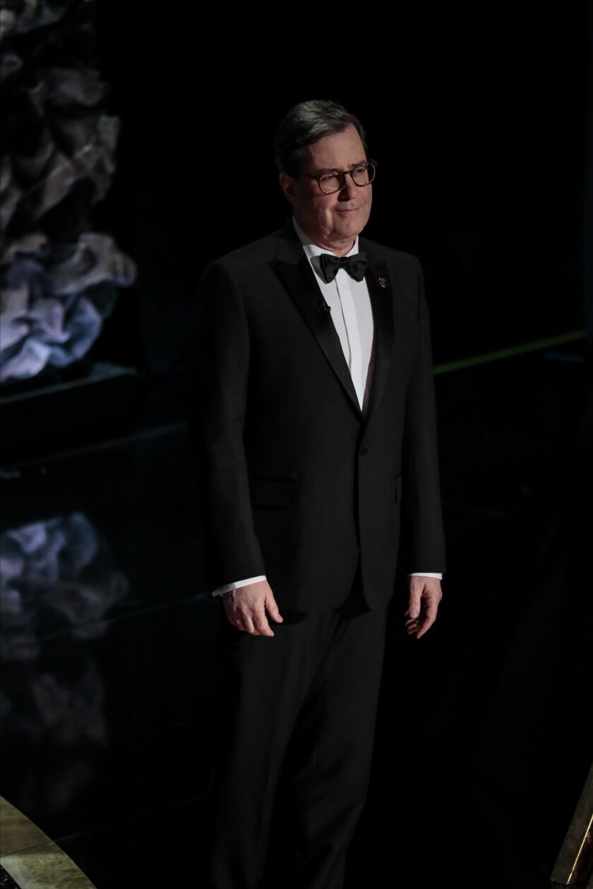 A man in a tuxedo onstage during the telecast of the 92nd Academy Awards