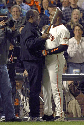 Controversial San Francisco Giants slugger Barry Bonds shares a special moment with his father, the late Bobby Bonds who also played for the Giants, after Barry hit his 500th career home run in 2001. Bobby Bonds passed away in August of 2003.