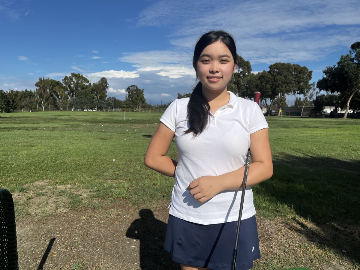 For years, Fountain Valley High golfer Dakota Lam poses for a photo.
