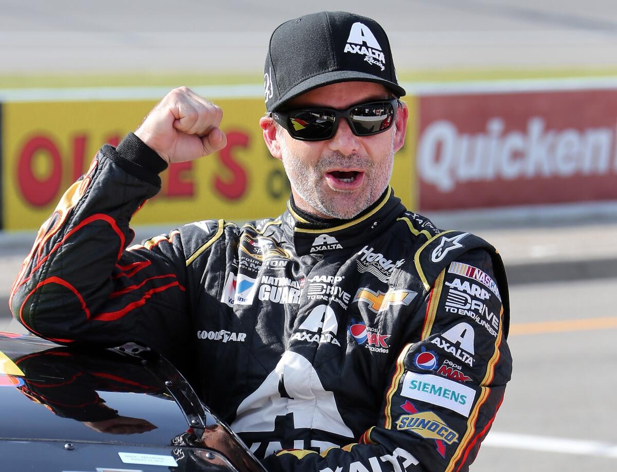 Jeff Gordon celebrates after winning the pole position on Friday for the NASCAR Sprint Cup Series race at Michigan International Speedway this weekend.