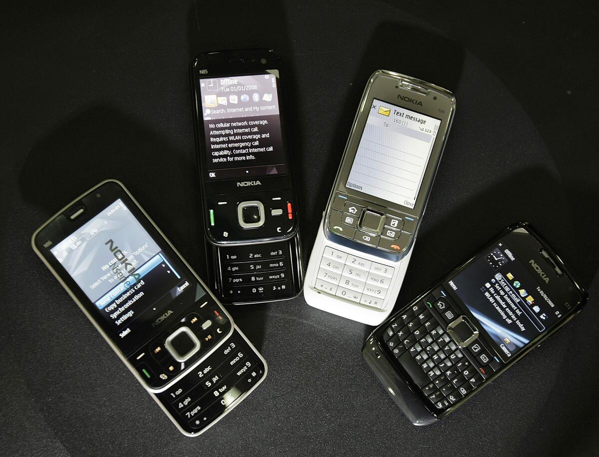 Old-fashioned Nokia cellphones displayed in 2009.