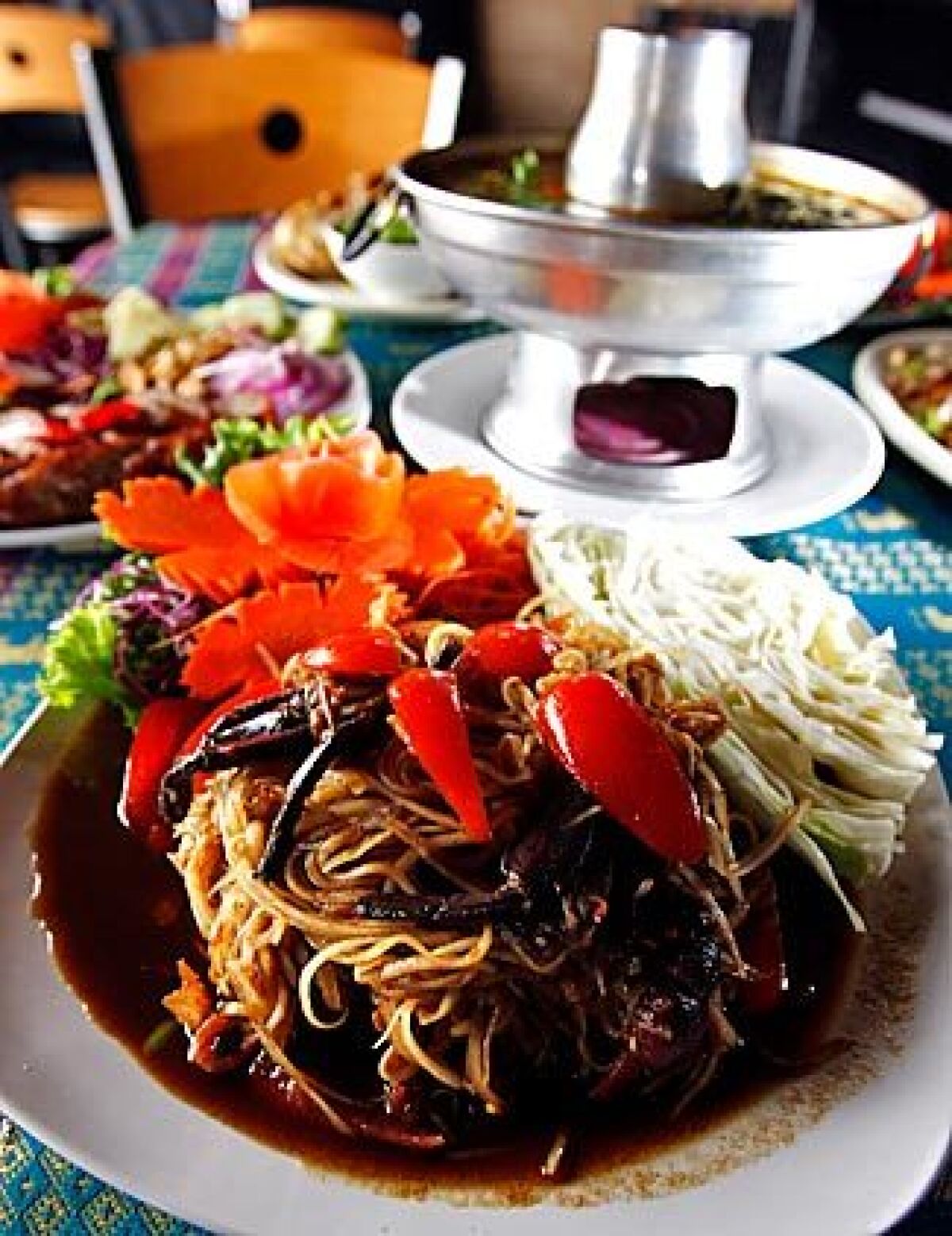 Laotian papaya salad gets its bold flavor from a dressing made with fermented crab paste.