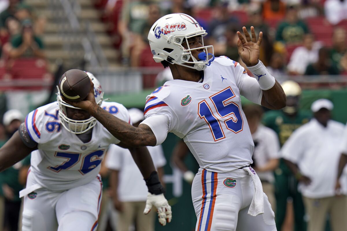 Florida quarterback Anthony Richardson throws a pass against South Florida during the first half of an NCAA college football game Saturday, Sept. 11, 2021, in Tampa, Fla. (AP Photo/Chris O'Meara)