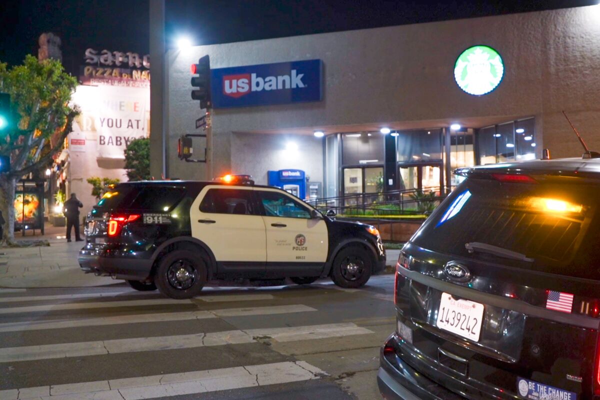 LAPD cruisers outside a US Bank building