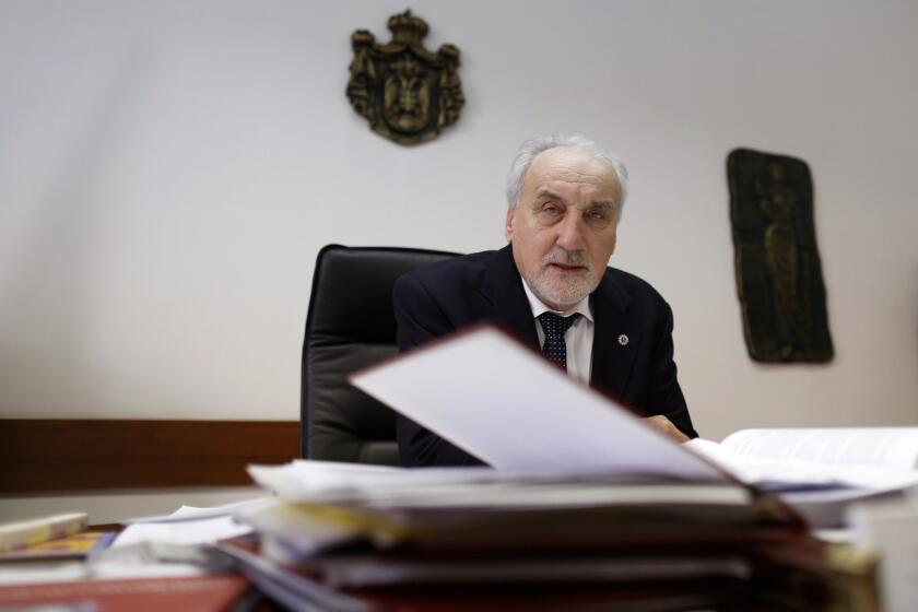 Serbia's war crimes prosecutor Vladimir Vukcevic speaks during an interview with The Associated Press, in Belgrade, Serbia, Wednesday on March 18, 2015.