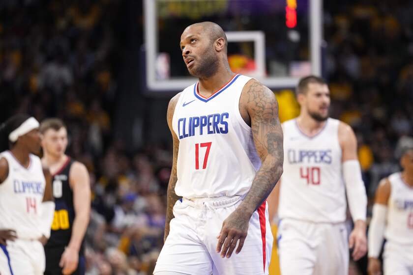Los Angeles Clippers forward P.J. Tucker reacts during the first half of the team's NBA.