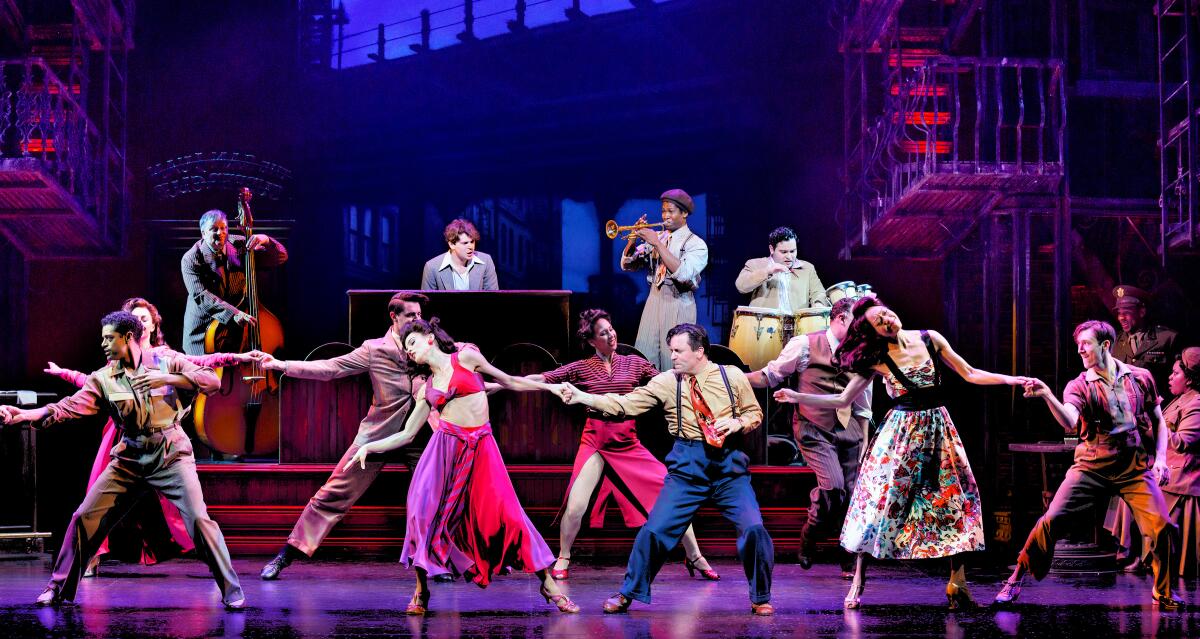 people dance in a broadway show 