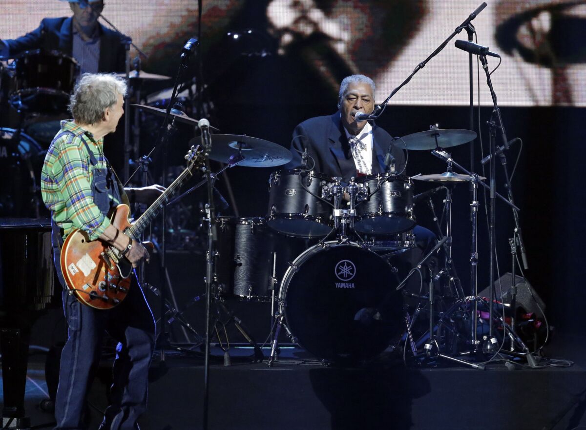 Sam Lay, right, performs with the Paul Butterfield Blues Band.