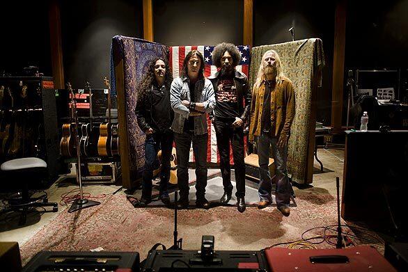 Members of the rock band Alice in Chains; from left, Mike Inez, bass, Sean Kinney, drummer, William Duvall, vocals and guitar, and Jerry Cantrell, vocals and guitar. Photographed at Henson Recording Studios in Hollywood in March, the band is working on their first record in 14 years, with new singer/guitarist Duvall.