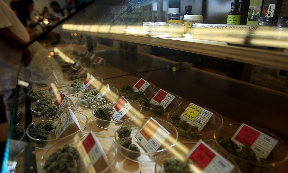 A new poll finds that a majority of Americans don't believe employees should be fired for marijuana use outside of work. Above, a dispensary in Oakland.