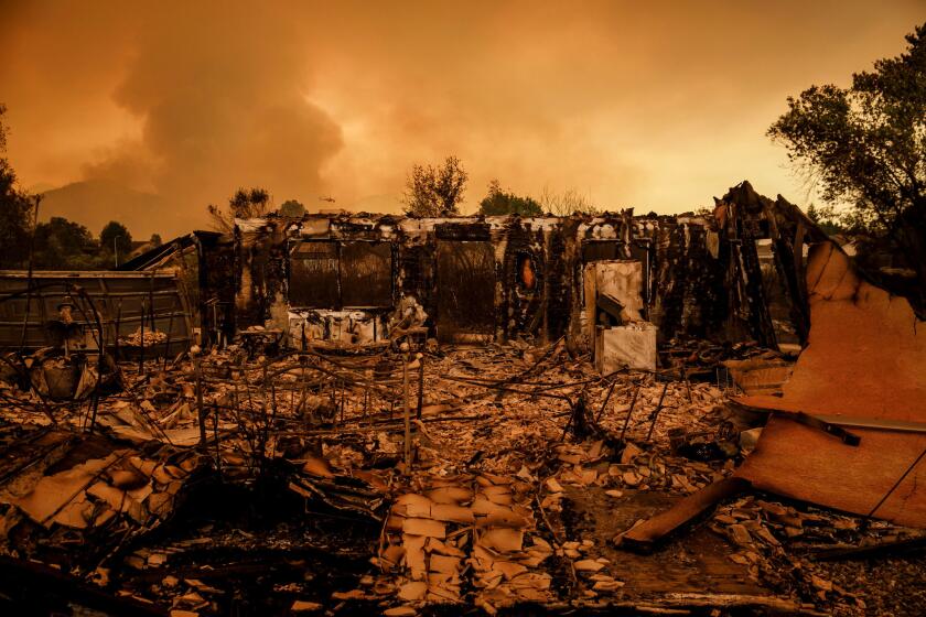 The Carr wildfire destroyed homes overnight in Lake Keswick Estates near Redding, Calif., on July 27, 2018.
