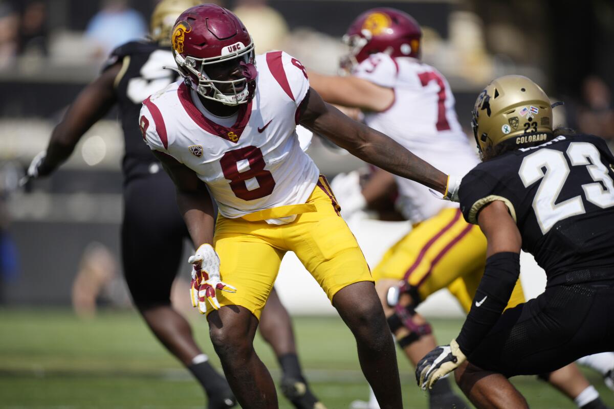 USC tight end Michael Trigg blocks against Colorado on Oct. 2.