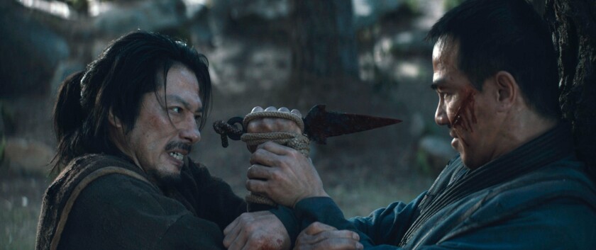 Hiroyuki Sanada, left, in a fight scene with Joe Taslim