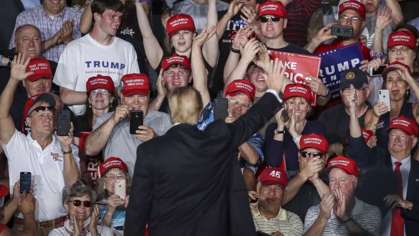 A crowd cheers at a 2019 rally for President Trump in Pennsylvania.