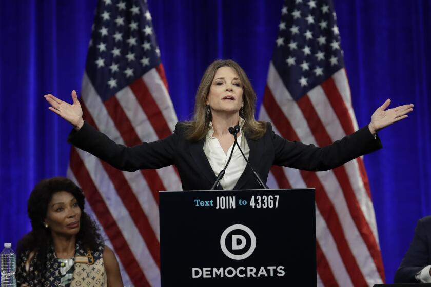 Marianne Williamson, 2020 Democratic presidential hopeful, gestures while speaking at the Democratic National Committee's summer meeting Friday, Aug. 23, 2019, in San Francisco. More than a dozen Democratic presidential hopefuls are making their way to California to curry favor with national party activists from around country. Democratic National Committee members will hear Friday from top contenders, including Elizabeth Warren, Kamala Harris and Bernie Sanders. (AP Photo/Ben Margot)